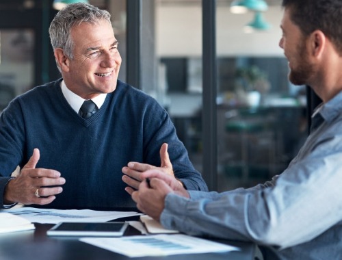 Two businessmen in conversation