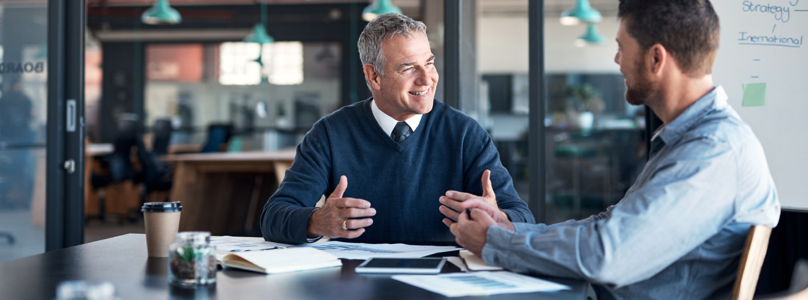 Two businessmen in conversation