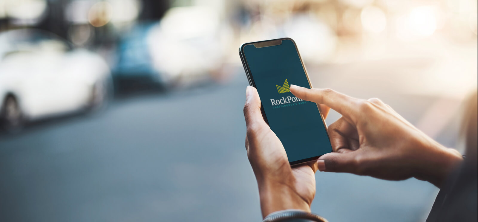 Rockpoint Bank logo on a phone